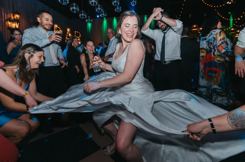 Your First Dance Song Is Not Your Reception Playlist: The Art of Choosing Music Your Guests Will Actually Move To
